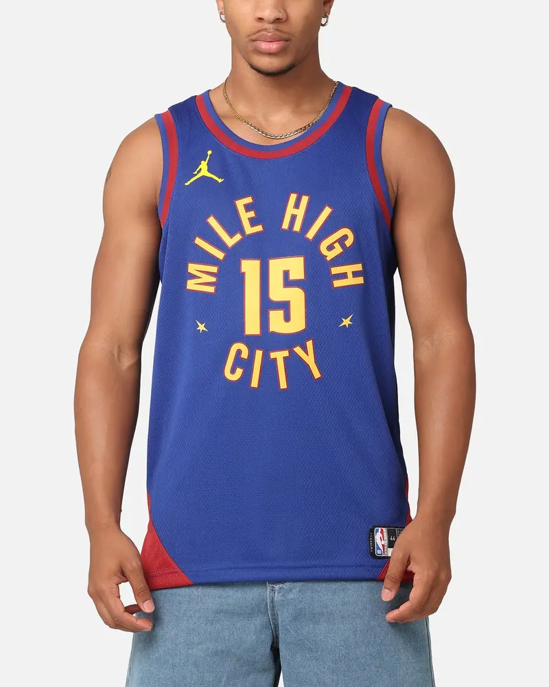 Jordan Denver Nuggets Nikola Jokić Statement Edition 2022/23 Dri-Fit Swingman Jersey Rush Blue/Team Crimson 1