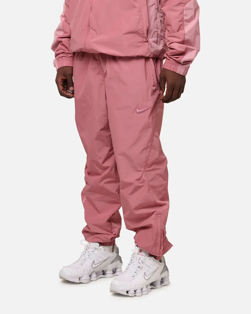 Nike Nocta Northstar Nylon Track Pants Desert Berry 1